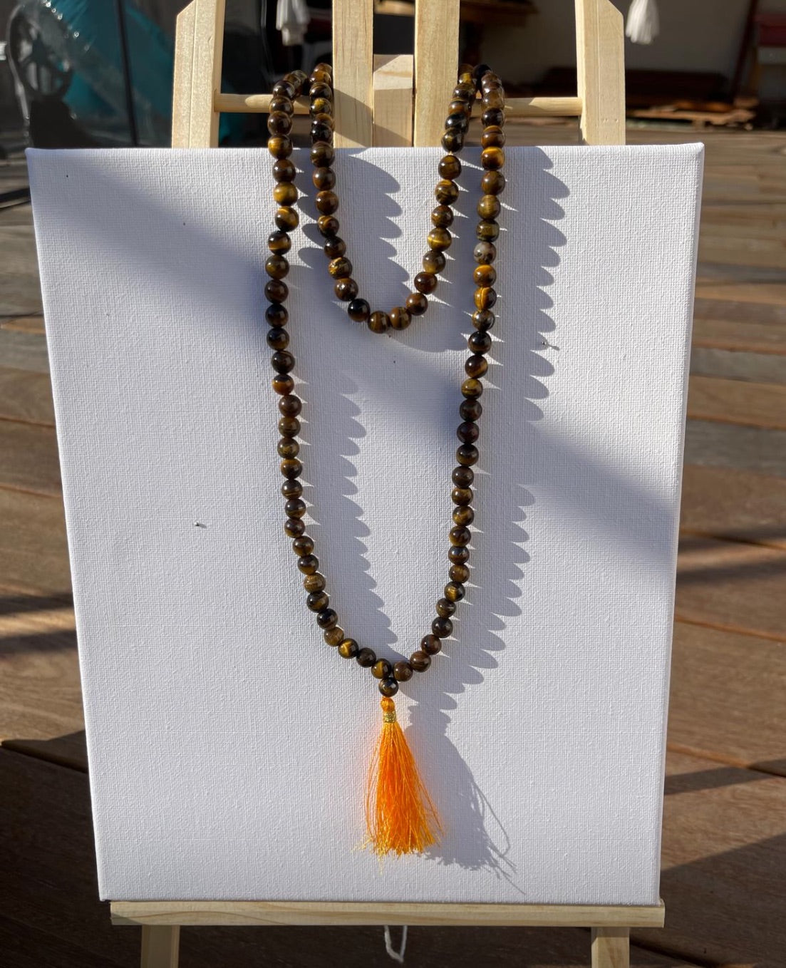 Mala en Œil de Tigre – Protection & Confiance